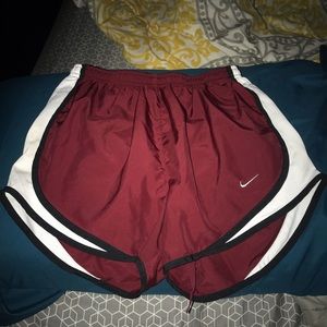 Burgundy nike running shorts